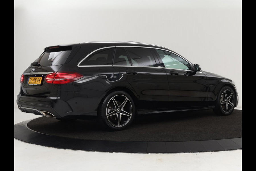 Mercedes-Benz C-Klasse 300e AMG | Stoelventilatie | Panoramadak | Leder | Burmester | Memory | Luchtvering | Carplay | Stoelverwarming | Navigatie | Full LED