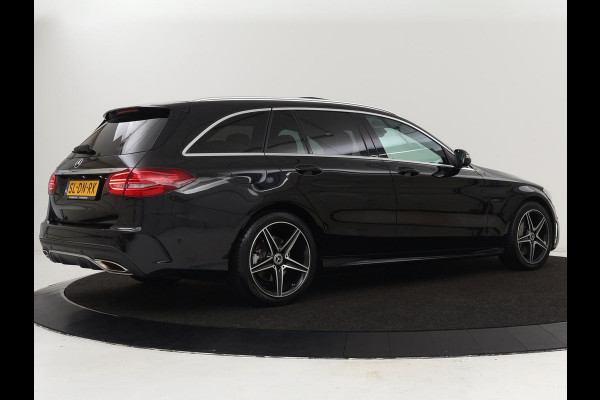 Mercedes-Benz C-Klasse 300e AMG | Stoelventilatie | Panoramadak | Leder | Burmester | Memory | Luchtvering | Carplay | Stoelverwarming | Navigatie | Full LED