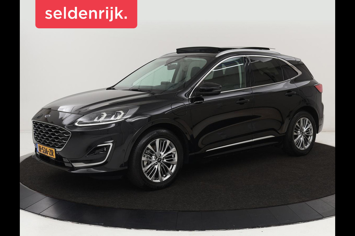 Ford Kuga 2.5 PHEV Vignale | Panoramadak | Leder | Head-Up | Stoel & stuurverwarming | Camera | Adaptive cruise | B&O Sound | Carplay | Navigatie | Full LED | Keyless Ford Kuga 2.5 PHEV Vignale | Panoramadak | Leder | Head-Up | Stoel & stuurverwarming | Camera | Adaptive cruise | B&O Sound | Carplay | Navigatie | Full LED | Keyless