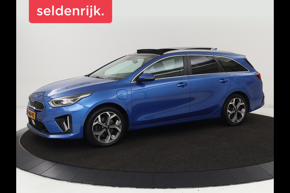 Kia Ceed 1.6 GDI PHEV ExecutiveLine | Panoramadak | Stoelventilatie | Leder | Trekhaak | Adaptive cruise | Camera | Keyless | Digital Cockpit | Full LED | Achterbankverwarming | Carplay | Navigatie Kia Ceed 1.6 GDI PHEV ExecutiveLine | Panoramadak | Stoelventilatie | Leder | Trekhaak | Adaptive cruise | Camera | Keyless | Digital Cockpit | Full LED | Achterbankverwarming | Carplay | Navigatie