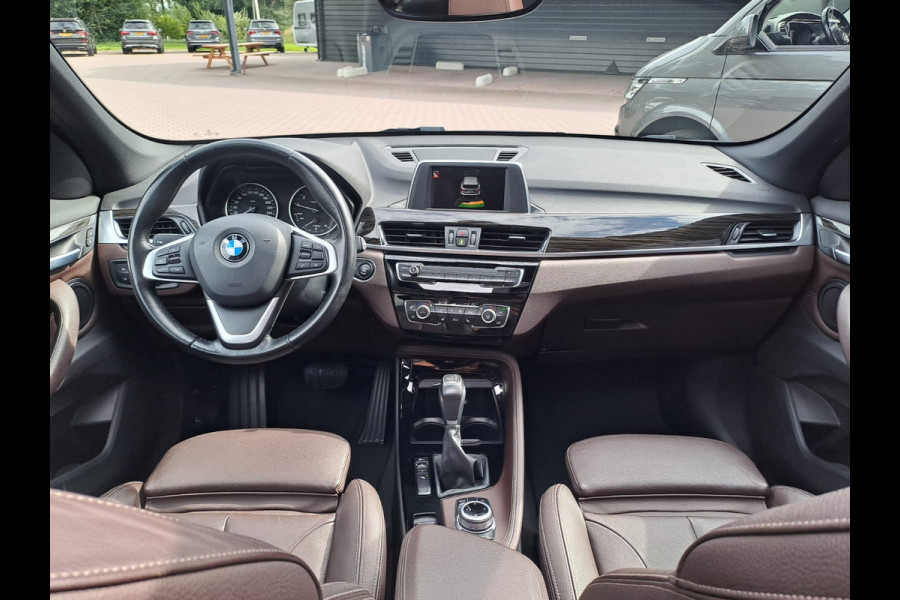 BMW X1 sDrive18i High Executive | Automaat | Leder | Pano | Trekhaak | Cruise | PDC | All-seasons |