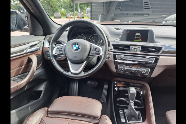 BMW X1 sDrive18i High Executive | Automaat | Leder | Pano | Trekhaak | Cruise | PDC | All-seasons |