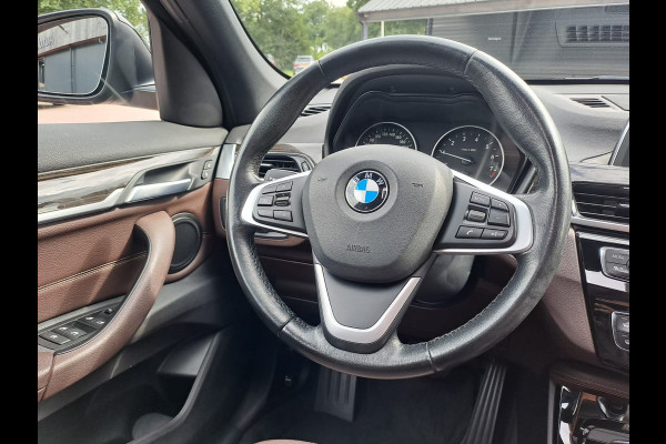 BMW X1 sDrive18i High Executive | Automaat | Leder | Pano | Trekhaak | Cruise | PDC | All-seasons |