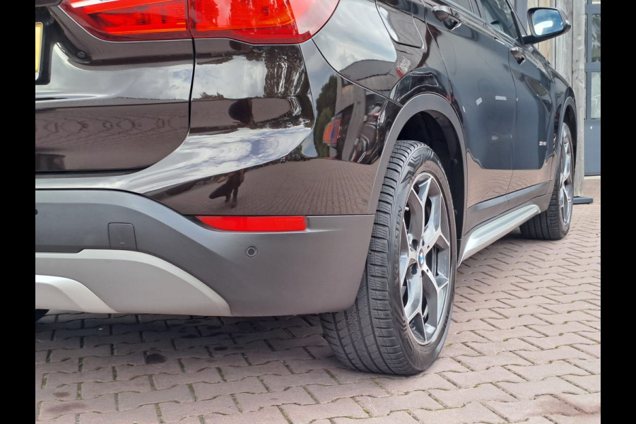 BMW X1 sDrive18i High Executive | Automaat | Leder | Pano | Trekhaak | Cruise | PDC | All-seasons |