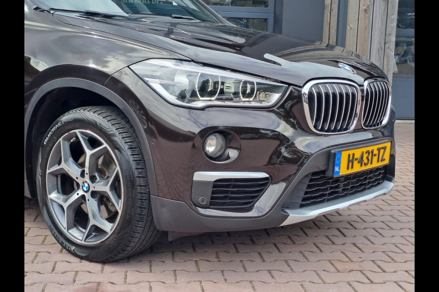 BMW X1 sDrive18i High Executive | Automaat | Leder | Pano | Trekhaak | Cruise | PDC | All-seasons |