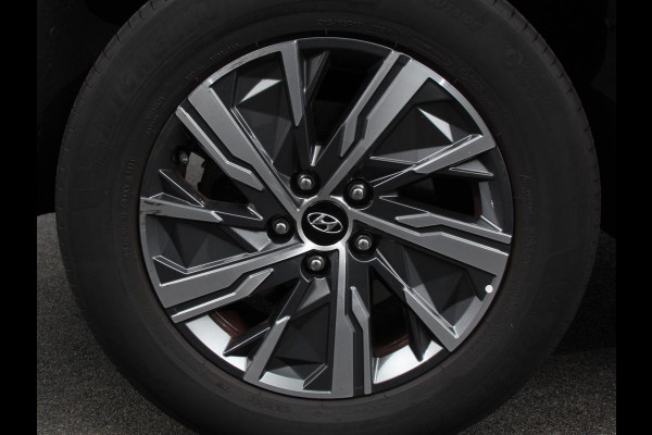 Hyundai Tucson 1.6 T-GDI HEV Comfort Climate control Adaptieve cruise control Parkeersensoren Achteruitrijcamera Navigatie Voorstoelen verwarmd Apple Carplay/ Android Auto