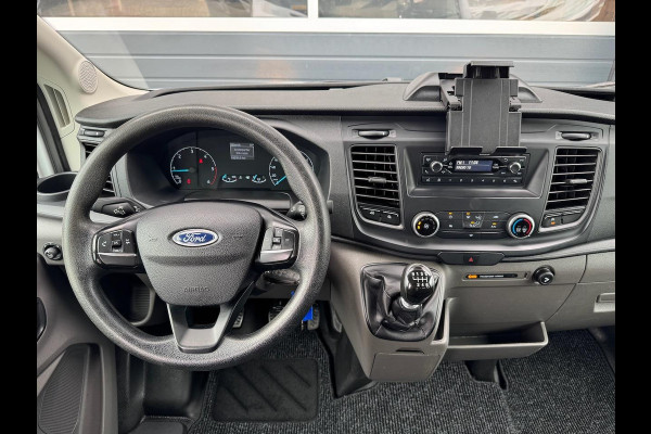 Ford Transit 2.0 TDCI 130pk L2 DC Pick-up | 7-pers | Airco | Trekhaak 2550KG | Bluetooth | 2.4m x 2.1m laadbak | Betonplex