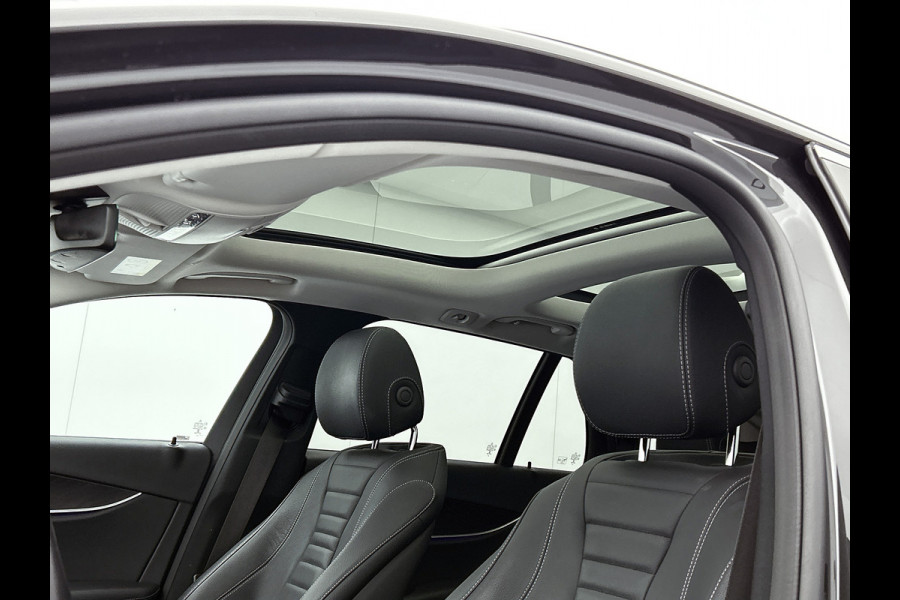 Mercedes-Benz E-Klasse Estate 300 e Business Solution AMG | Panoramadak | Wide screen | Navigatie | Elect. bedinebare voor stoelen met geheugen | Parking support met camera achter | Inclusief 24 maanden Mercedes-Benz Certified garantie voor Europa.