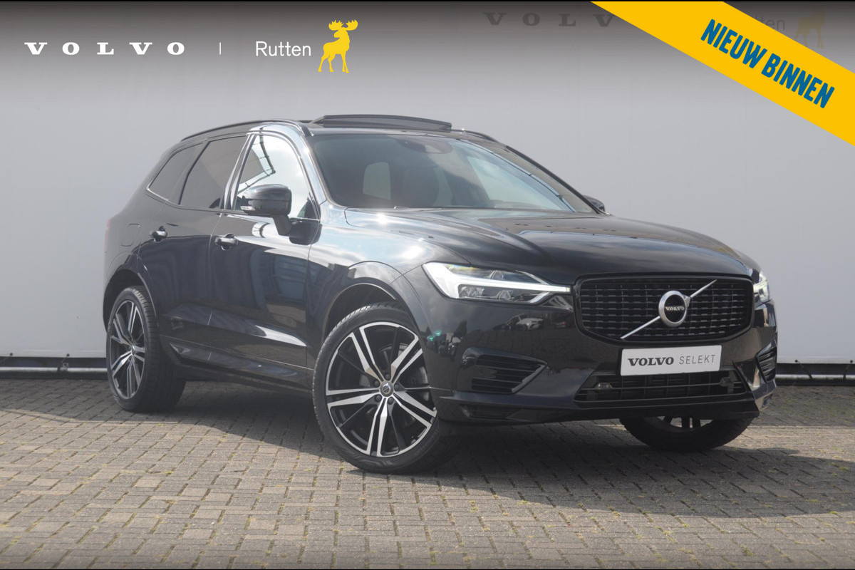 Volvo XC60 T6 340PK Automaat Recharge AWD R-Design / Cruise control / Harman Kardon Audio / Elektrische achterklep / Apple carplay / parkeersensoren met camera / Elektrische stoelen / Panoramadak / Sportstoelen / Stoel - en stuurwielverwarming / Keyless entry Volvo XC60 T6 340PK Automaat Recharge AWD R-Design / Cruise control / Harman Kardon Audio / Elektrische achterklep / Apple carplay / parkeersensoren met camera / Elektrische stoelen / Panoramadak / Sportstoelen / Stoel - en stuurwielverwarming / Keyless entry