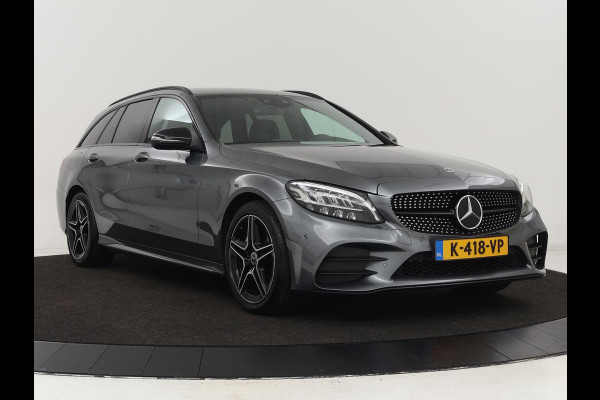 Mercedes-Benz C-Klasse 180 Business Solution AMG | Leder | Trekhaak | Stoelverwarming | Camera | Night Pack | Carplay | Side Assist | Digital Cockpit | Navigatie | Full LED | Park Assist
