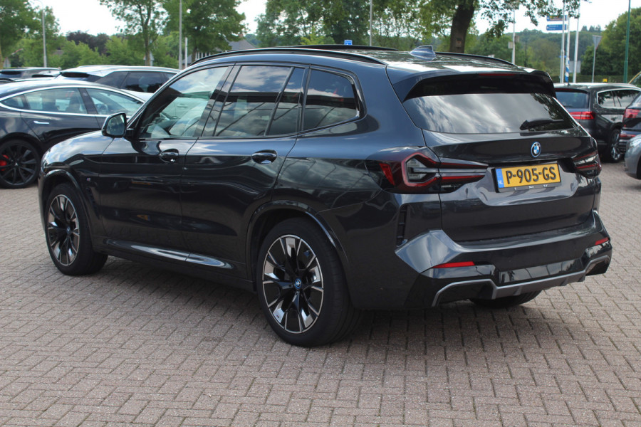 BMW iX3 High Executive 80 kWh / SoH 98.4% / Trekhaak / Panoramadak / 360Camera / Head-up / 20'' / Leder / Harman Kardon / Sfeerverlichting / Dodehoek / DAB / Stuur+Stoelverwarming / ACC