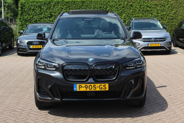 BMW iX3 High Executive 80 kWh / SoH 98.4% / Trekhaak / Panoramadak / 360Camera / Head-up / 20'' / Leder / Harman Kardon / Sfeerverlichting / Dodehoek / DAB / Stuur+Stoelverwarming / ACC