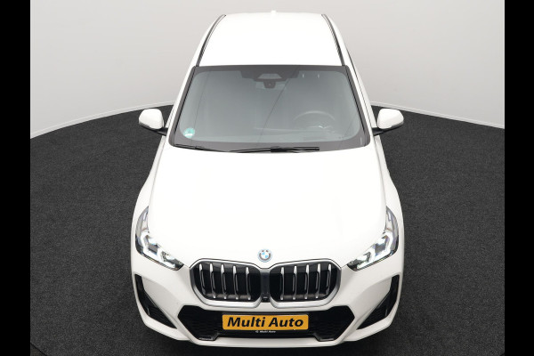 BMW X1 xDrive30e M Sport Plug In Hybrid 326pk Dealer O.H PHEV | Trekhaak Af Fabriek | Head Up | 360 Camera | Adaptive Cruise | Harman Kardon | Alcantara Sportstoelen Memory & Verwarmd | Apple Carplay | Navigatie | Sfeerverlichting |