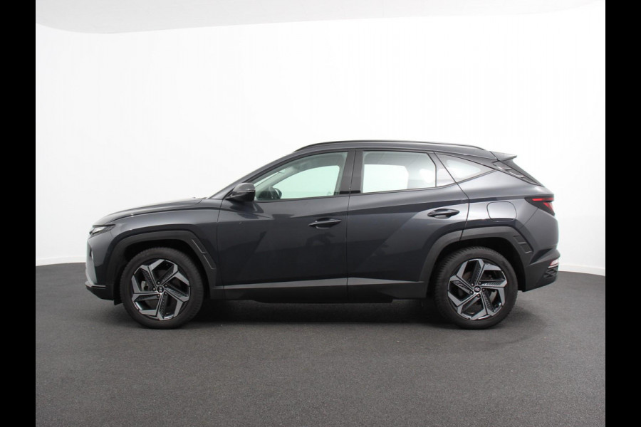 Hyundai Tucson 1.6 T-GDI PHEV Comfort 4WD Climate control Adaptieve cruise control Parkeersensoren achter Achteruitrij camera Navigatie LED Apple Carplay/ Android Auto