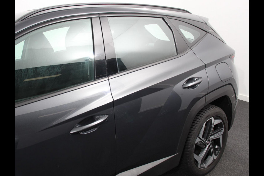 Hyundai Tucson 1.6 T-GDI PHEV Comfort 4WD Climate control Adaptieve cruise control Parkeersensoren achter Achteruitrij camera Navigatie LED Apple Carplay/ Android Auto