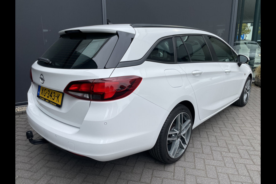 Opel Astra Sports Tourer 1.0 Turbo Online Edition Airco - Cruise control - Parkeersensoren achter - Licht metalen velgen 18 inch - Navigatie - Lederen stuurwiel