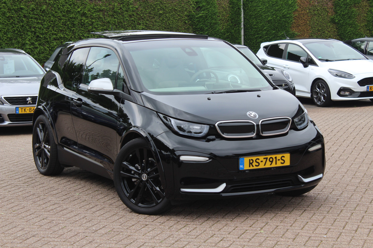 BMW i3 S iPerformance 94Ah 33 kWh / SoH 89.6% / Full option! / Panoramadak / Camera / Keyless / 20'' / Warmtepomp / Harman Kardon / Apple CarPlay / DAB / Getint glas / Stoelverwarming / ACC