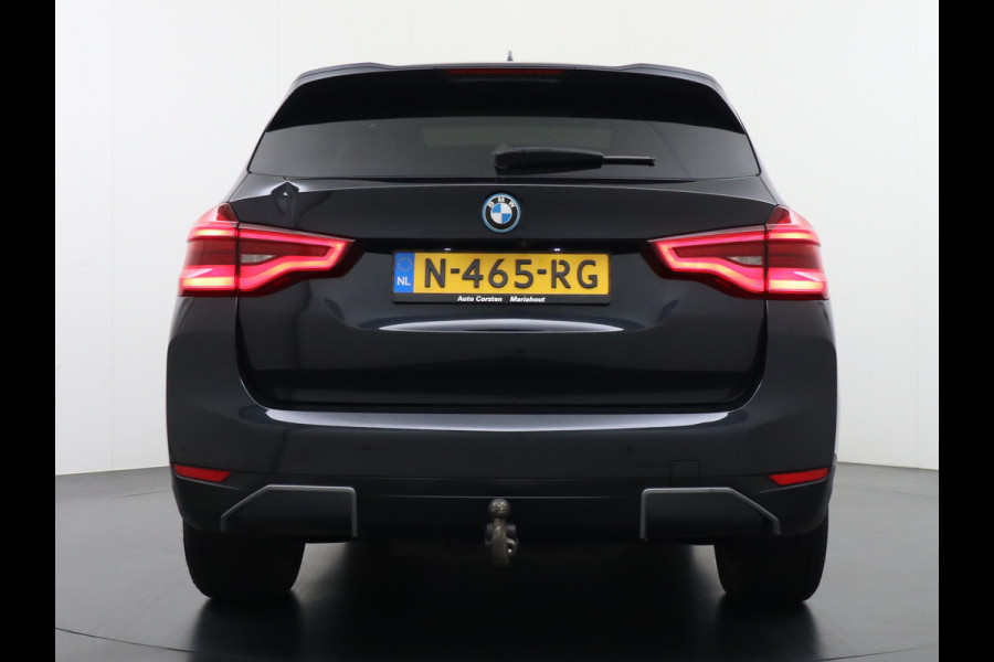 BMW iX3 Executive 80kWhPanoramadak Leer+Verwarmd+Memory Adaptieve LEDApple Carplay Android Auto Trekhaak Pdc Camera DAB Live Cockpit Pro Lmv Elek.Achterklep Regen-Lichtsensor Achteruitrij-assistent 1e Eigenaar Origineel Nederlands Nieuwprijs €68.172,-