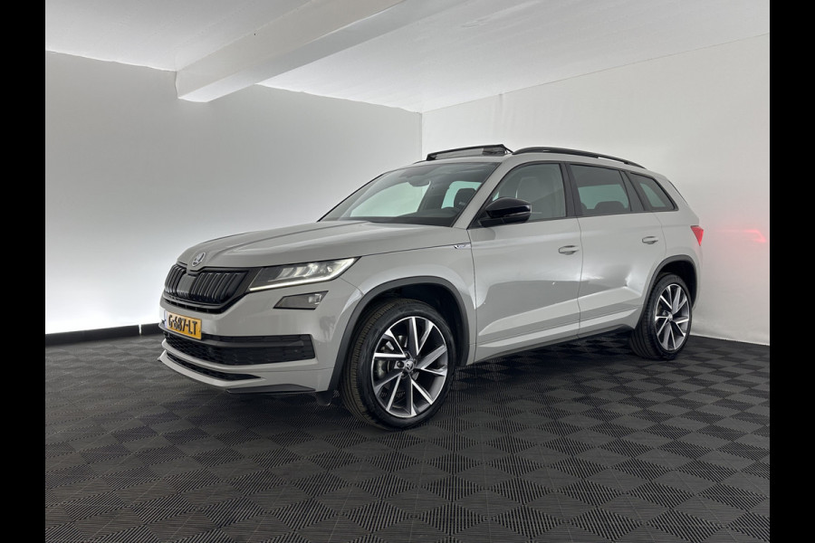 Škoda Kodiaq 1.5 TSI Sportline Business Aut. *PANO | LEATHER-ALCANTARA | FULL-LED | MEMORY-PACK | CANTON-SOUND | CAMERA | KEYLESS | DIGI-COCKPIT | SPORTSEATS | DAB+ | AMBIENT-LIGHT | CARBON | TOWBAR | 20''ALU*