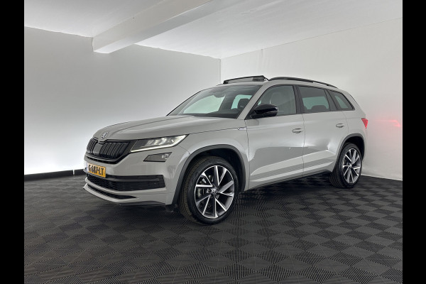 Škoda Kodiaq 1.5 TSI Sportline Business Aut. *PANO | LEATHER-ALCANTARA | FULL-LED | MEMORY-PACK | CANTON-SOUND | CAMERA | KEYLESS | DIGI-COCKPIT | SPORTSEATS | DAB+ | AMBIENT-LIGHT | CARBON | TOWBAR | 20''ALU*