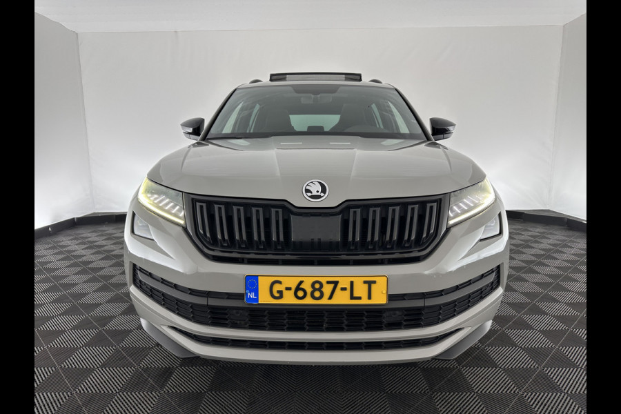 Škoda Kodiaq 1.5 TSI Sportline Business Aut. *PANO | LEATHER-ALCANTARA | FULL-LED | MEMORY-PACK | CANTON-SOUND | CAMERA | KEYLESS | DIGI-COCKPIT | SPORTSEATS | DAB+ | AMBIENT-LIGHT | CARBON | TOWBAR | 20''ALU*