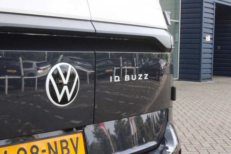 Volkswagen ID. Buzz CARGO 79 kWh | TREKHAAK ELEKTRISCH WEGKLAPBAAR | LAADRUIMTE PAKKET | STOEL/VOORRUIT VERWARMING | ELEKTRISCH BEDIENBARE SCHUIFDEUR | NAVIGATIE DISCOVER PRO | DRAADLOZE APPLE CARPLAY/ANDROID AUTO | CLIMATE CONTROL | ACHTERUITRIJ CAMERA | DODEHOEK DETECTIE | ADAPTIVE CRUISE CONTROL | NIEUWE BUS! | KEYLESS ENTRY/START | SFEER VERLICHTING | 3-ZITS |