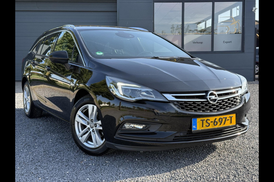 Opel Astra Sports Tourer 1.4 Innovation Automaat,Navi,Trekhaak,Camera,Clima,Cruise,150pk,Lm velgen,Pdc V+A,Elekt.Stoelen,Stoelverwarming,Stuurverwarming,Apk tot 07-2026