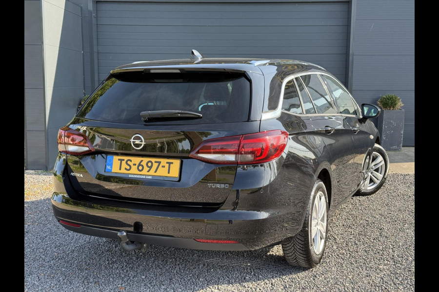 Opel Astra Sports Tourer 1.4 Innovation Automaat,Navi,Trekhaak,Camera,Clima,Cruise,150pk,Lm velgen,Pdc V+A,Elekt.Stoelen,Stoelverwarming,Stuurverwarming,Apk tot 07-2026