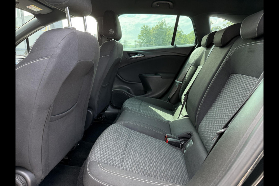 Opel Astra Sports Tourer 1.4 Innovation Automaat,Navi,Trekhaak,Camera,Clima,Cruise,150pk,Lm velgen,Pdc V+A,Elekt.Stoelen,Stoelverwarming,Stuurverwarming,Apk tot 07-2026