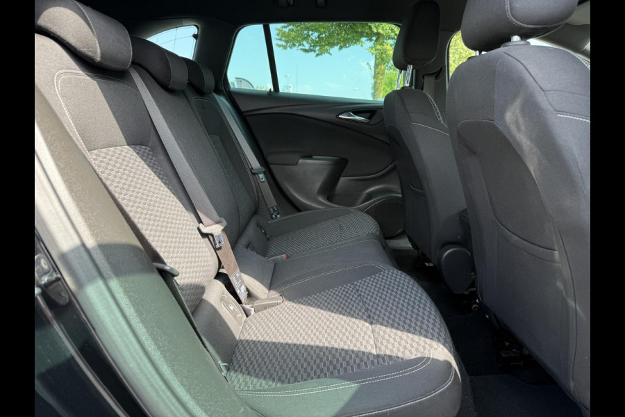 Opel Astra Sports Tourer 1.4 Innovation Automaat,Navi,Trekhaak,Camera,Clima,Cruise,150pk,Lm velgen,Pdc V+A,Elekt.Stoelen,Stoelverwarming,Stuurverwarming,Apk tot 07-2026