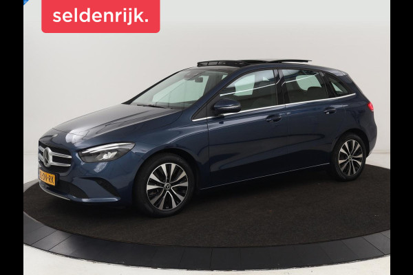 Mercedes-Benz B-Klasse 250e Style | Stoelventilatie | Panoramadak | Massage | Leder | Trekhaak | Carplay | Adaptive cruise | Stuurverwarming | Widescreen | Park Assist | Camera | Navigatie | Memory | PHEV | Plug In