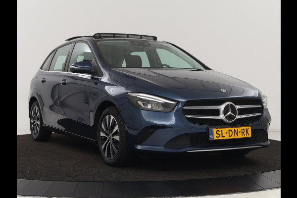 Mercedes-Benz B-Klasse 250e Style | Stoelventilatie | Panoramadak | Massage | Leder | Trekhaak | Carplay | Adaptive cruise | Stuurverwarming | Widescreen | Park Assist | Camera | Navigatie | Memory | PHEV | Plug In