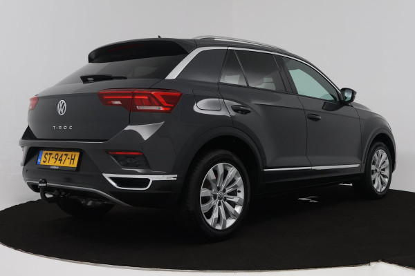 Volkswagen T-Roc 1.5 TSI Sport (TREKHAAK, DIGITALE COCKPIT, STOELVERWARMING, AUTOMAAT, ACHTERUITRIJCAMERA, SFEERVERLICHTING)