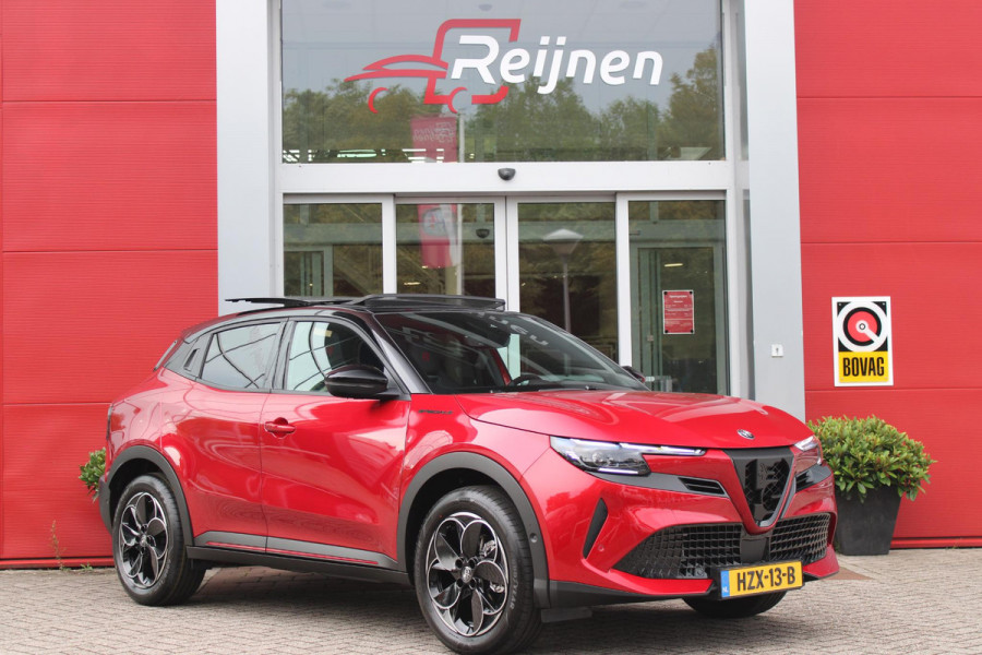 Alfa Romeo junior 1.2 Turbo 136PK Hybrid IBRIDA SPECIALE | PANORAMISCH SCHUIF/KANTEL DAK | SPORT PACK: SABELT SPORT STOELEN/ALCANTARA STUURWIEL | TECHNO PACK: LED MATRIX KOPLAMPEN/DRAADLOZE TELEFOONLADER/ACHTERUITRIJ CAMERA | VERWARMBARE VOORRUIT | 18" LICHTMETALEN VELGEN "PETALI" | DRAADLOZE APPLE CARPLAY/ANDROID AUTO | BRERA RED MET ZWART DAK | NAVIGATIE | STOEL VERWARMING | DODEHOEK DETECTIE | ELEKTRISCH BEDIENBARE ACHTERKLEP | KEYLESS ENTRY/START | ADAPTIVE CRUISE CONTROL |