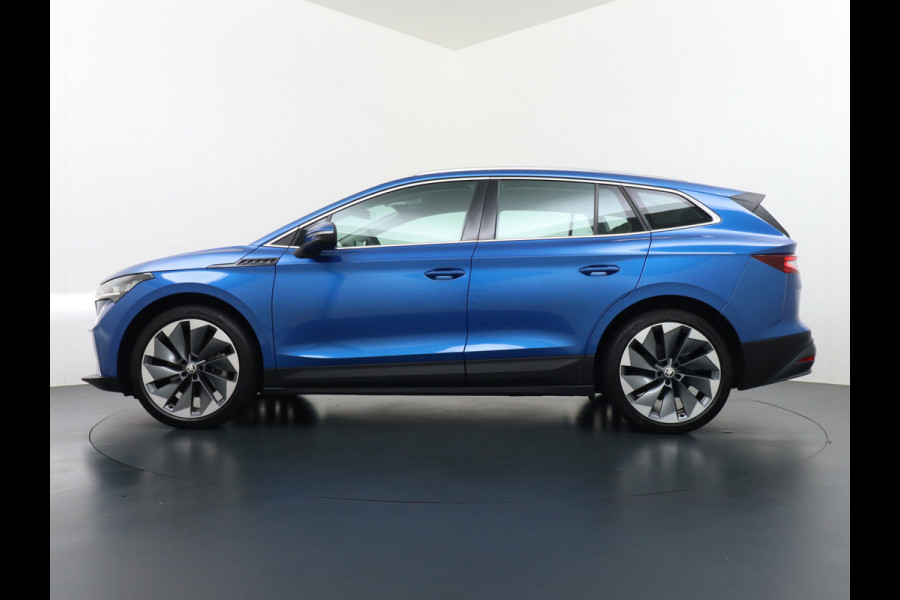 Škoda ENYAQ iV 80 204pk AUT. LEER Camera Adaptive-cruise+Stop/Go Head-Up Display Trekhaak Apple Carplay Android Auto Smartlink Adap.Cruise 21"  Spoorwisselassistent Verkeersborddetectie Sproeiers verwarmd Stoelen v/a verwarmd Grote Accu! Trekhaaksyst elektrisch Wegklapbaar. 1.000KG Trekgewicht! Zeer Compleet €56.000,- nieuw Grootste Actieradius/accu pakket.