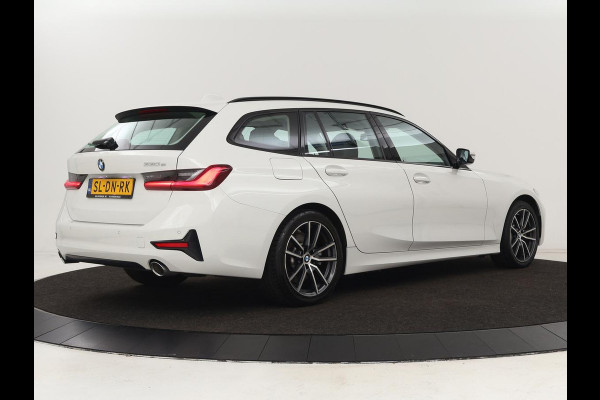 BMW 3-serie 330e Sport Line | Stoelverwarming | Adaptive cruise | Sportstoelen | Sfeerverlichting | Navigatie | Full LED | Half leder | Live Cockpit | Parkeerhulp | Climate control | PHEV | Plug In