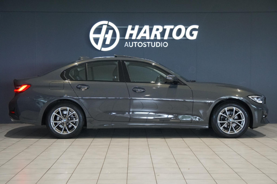 BMW 3 Serie 318i High Executive + SCHUIFDAK / LASERLIGHT / TREKHAAK / LEDER / INDIVIDUAL / DRAVITGRAU