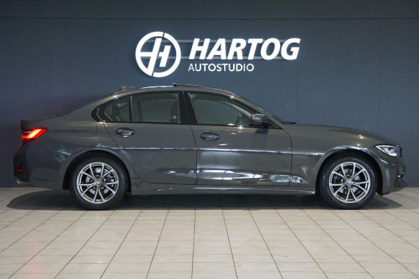 BMW 3 Serie 318i High Executive + SCHUIFDAK / LASERLIGHT / TREKHAAK / LEDER / INDIVIDUAL / DRAVITGRAU