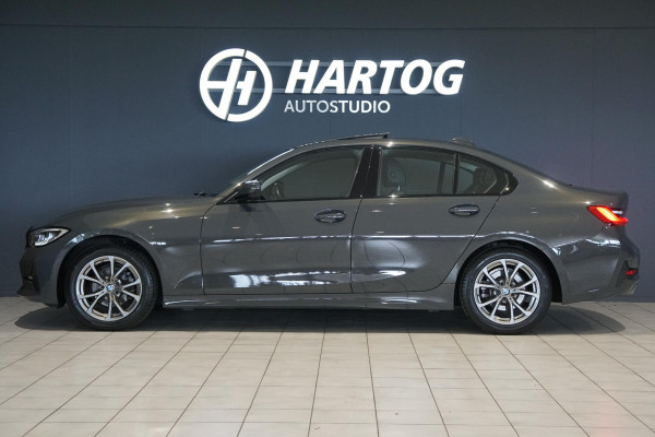 BMW 3 Serie 318i High Executive + SCHUIFDAK / LASERLIGHT / TREKHAAK / LEDER / INDIVIDUAL / DRAVITGRAU