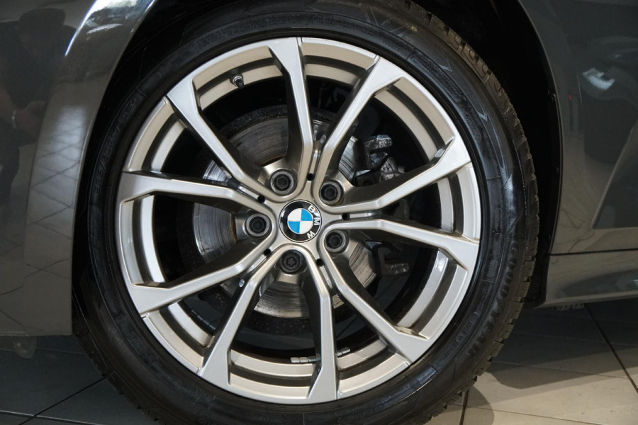 BMW 3 Serie 318i High Executive + SCHUIFDAK / LASERLIGHT / TREKHAAK / LEDER / INDIVIDUAL / DRAVITGRAU