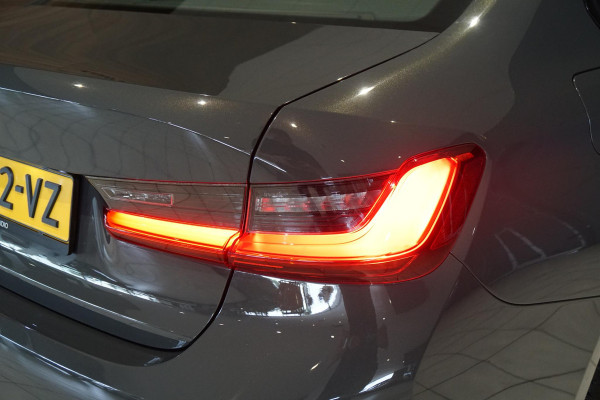 BMW 3 Serie 318i High Executive + SCHUIFDAK / LASERLIGHT / TREKHAAK / LEDER / INDIVIDUAL / DRAVITGRAU