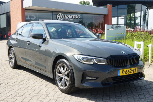 BMW 3 Serie 318i High Executive + SCHUIFDAK / LASERLIGHT / TREKHAAK / LEDER / INDIVIDUAL / DRAVITGRAU