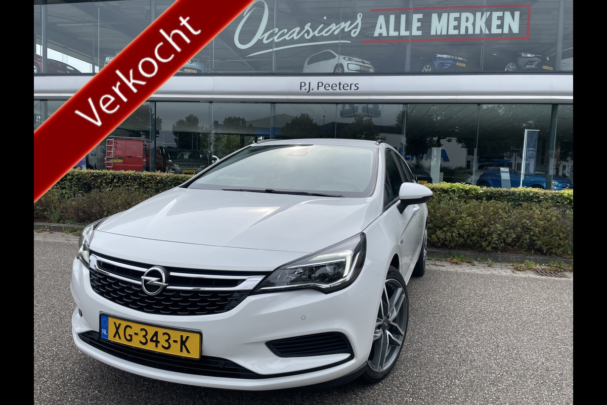 Opel Astra Sports Tourer 1.0 Turbo Online Edition Airco - Cruise control - Parkeersensoren achter - Licht metalen velgen 18 inch - Navigatie - Lederen stuurwiel Opel Astra Sports Tourer 1.0 Turbo Online Edition Airco - Cruise control - Parkeersensoren achter - Licht metalen velgen 18 inch - Navigatie - Lederen stuurwiel