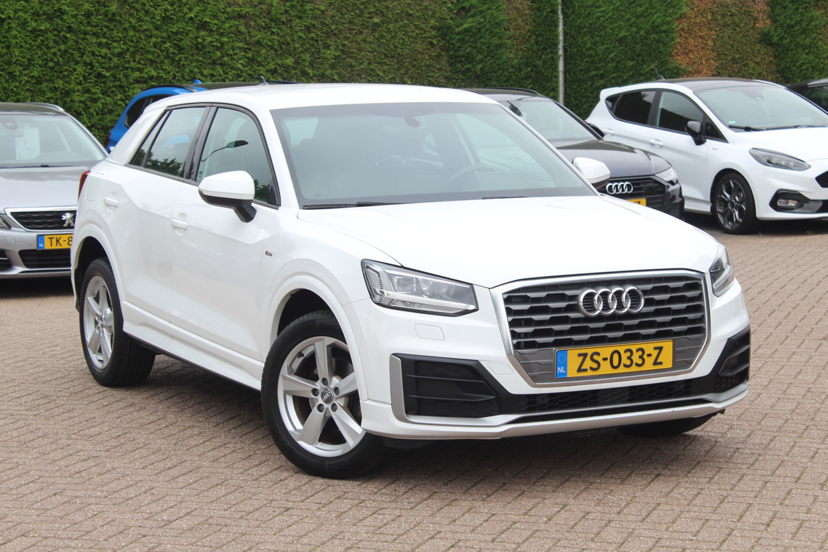 Audi Q2 35 TFSI CoD Sport S line Edition / Navigatie / Parkeerhulp V+A / Sportstoelen / 17'' / LED / Half leder / Cruise Control Audi Q2 35 TFSI CoD Sport S line Edition / Navigatie / Parkeerhulp V+A / Sportstoelen / 17'' / LED / Half leder / Cruise Control