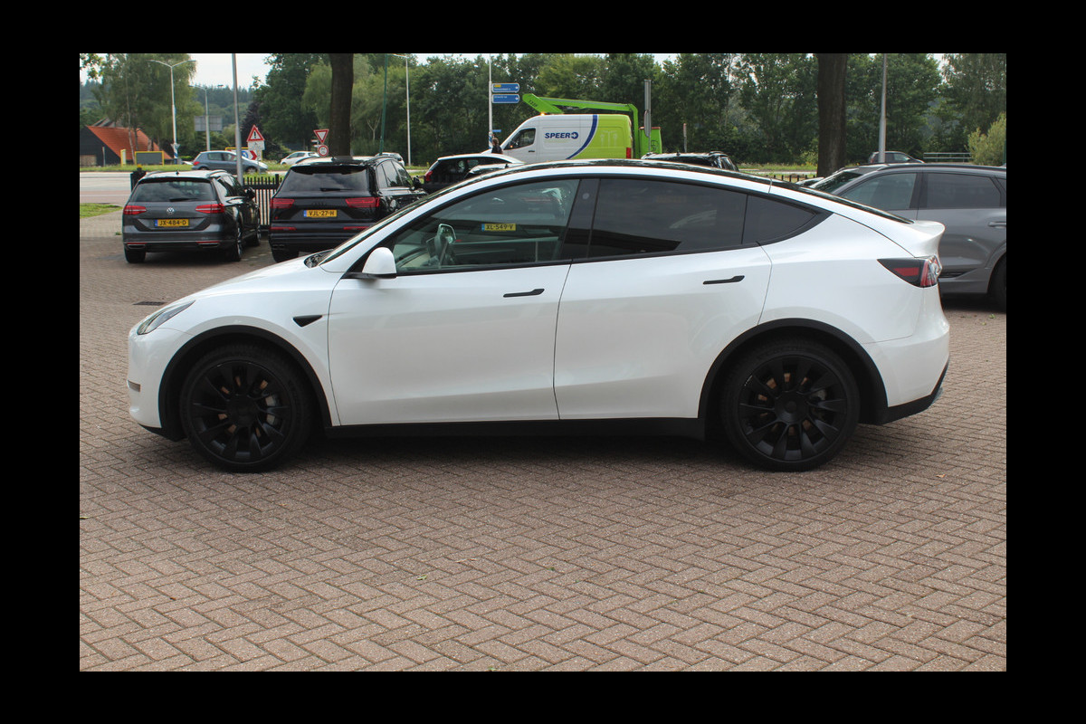 Tesla Model Y Long Range AWD 75 kWh / SoH 91.9% / Autopilot / Panoramadak / Camera / 21'' / Keyless / Leder / Dodehoek / Navigatie / Stoelverwarming Tesla Model Y Long Range AWD 75 kWh / SoH 91.9% / Autopilot / Panoramadak / Camera / 21'' / Keyless / Leder / Dodehoek / Navigatie / Stoelverwarming