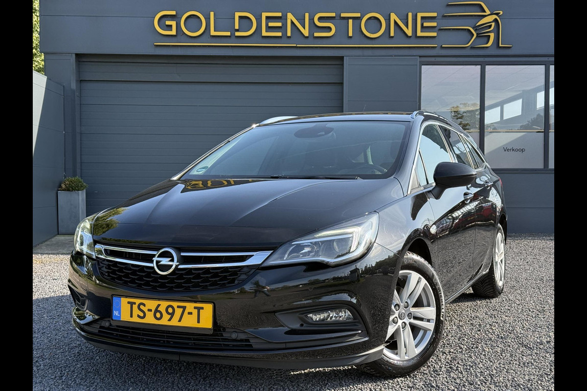 Opel Astra Sports Tourer 1.4 Innovation Automaat,Navi,Trekhaak,Camera,Clima,Cruise,150pk,Lm velgen,Pdc V+A,Elekt.Stoelen,Stoelverwarming,Stuurverwarming,Apk tot 07-2026