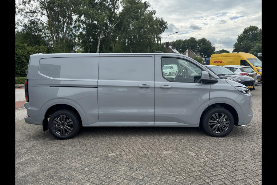 Ford E-Transit Custom 340 L2 Limited/Titanium 65 kWh / 218pk | SCI | Ford voorraad | Premium Lak: Grey Matter, Limited interieurbekleding, verwarmbare passagiersstoel (8-weg verstelbaar), centrale dubbele vergrendeling, 17 inch lichtmetalen velgen, Driver Assistance Pack, AGM Accu, BEV 3-fase oplaadkabel (mode 3, 32A, 10m) Vehicle Integration System Ford Voorraad