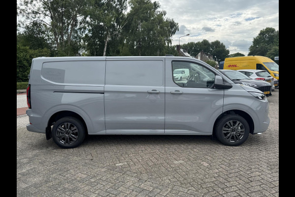 Ford E-Transit Custom 340 L2 Limited/Titanium 65 kWh / 218pk | SCI | Ford voorraad | Premium Lak: Grey Matter, Limited interieurbekleding, verwarmbare passagiersstoel (8-weg verstelbaar), centrale dubbele vergrendeling, 17 inch lichtmetalen velgen, Driver Assistance Pack, AGM Accu, BEV 3-fase oplaadkabel (mode 3, 32A, 10m) Vehicle Integration System Ford Voorraad