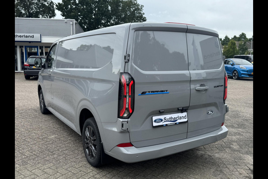 Ford E-Transit Custom 340 L2 Limited/Titanium 65 kWh / 218pk | SCI | Ford voorraad | Premium Lak: Grey Matter, Limited interieurbekleding, verwarmbare passagiersstoel (8-weg verstelbaar), centrale dubbele vergrendeling, 17 inch lichtmetalen velgen, Driver Assistance Pack, AGM Accu, BEV 3-fase oplaadkabel (mode 3, 32A, 10m) Vehicle Integration System Ford Voorraad
