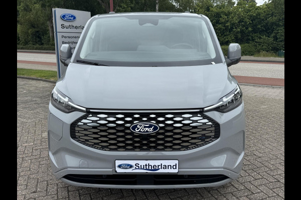 Ford E-Transit Custom 340 L2 Limited/Titanium 65 kWh / 218pk | SCI | Ford voorraad | Premium Lak: Grey Matter, Limited interieurbekleding, verwarmbare passagiersstoel (8-weg verstelbaar), centrale dubbele vergrendeling, 17 inch lichtmetalen velgen, Driver Assistance Pack, AGM Accu, BEV 3-fase oplaadkabel (mode 3, 32A, 10m) Vehicle Integration System Ford Voorraad